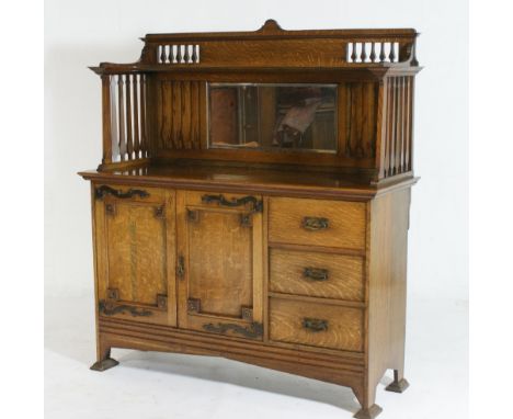 Arts and Crafts period oak mirror back sideboard, circa 1900, the back with a central bevelled glass mirror beneath a shelf a