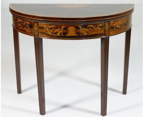 Mahogany and inlaid demi-lune folding card table in the Sheraton style, the top crossbanded with satinwood and with boxwood a