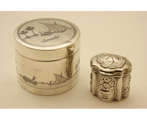 Dutch silver pill box, 19th Century, small caddy form repousse decorated with a vase of flowers and figural panels, also an E