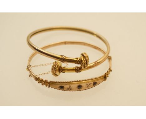 9ct gold bangle set with tiny rose diamonds and garnets, also a 9ct gold crossover bangle, gross weight approx. 17g (2)