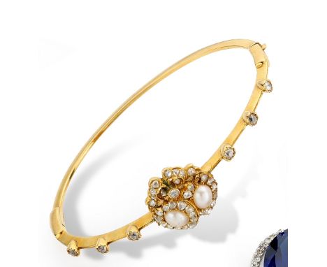 Edwardian diamond and pearl yellow gold bangle, having two pearls adjoined in hearts and bordered with rose cut diamonds, on 