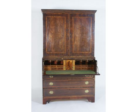 Late George III mahogany secretaire press cabinet, circa 1810, the top with crossbanded cornice and two satinwood banded door