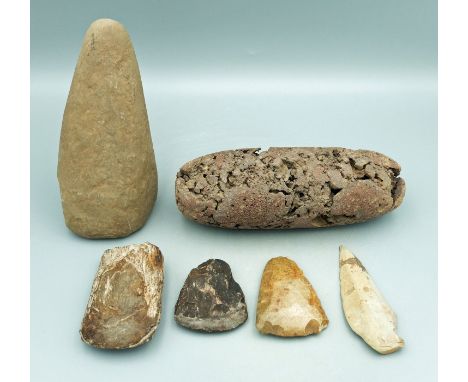 A group of Pre-Columbian stone tools consisting of a 7-1/4 in. long roller pestle from Costa Rica, a 6-1/2in. long hardstone 