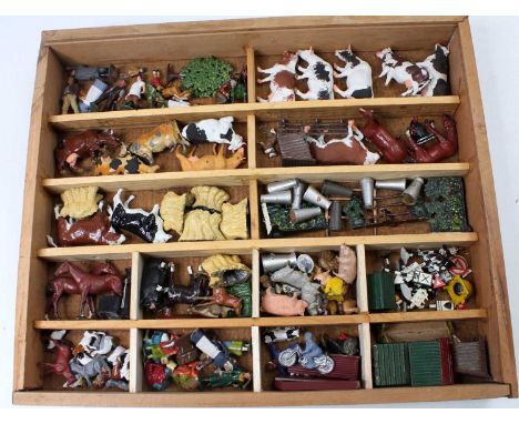 A wooden tray containing a large quantity of Britains / Johillco / Crescent / Taylor and Barrett lead figures, animals and fa