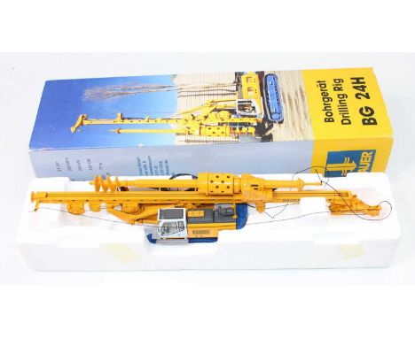 Brami Scale Models No,25005 1/50th scale diecast model of a Bauer BG 24H Drilling Rig, housed in the original polystyrene sle