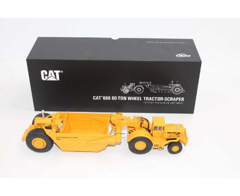 Classic Construction Models (CCM) 1/48th scale diecast model of a CAT 666 80-Ton Wheel Tractor Scraper, housed in the origina