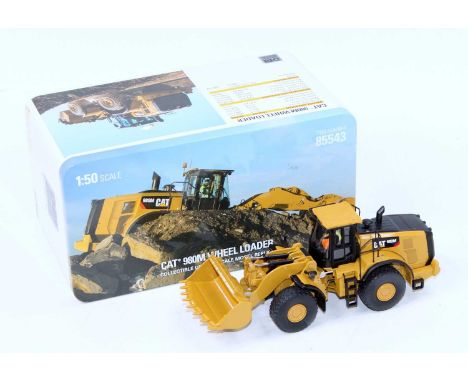 Diecast Masters No.85543, 1/50th scale model of a CAT 980M Wheel Loader, housed in the original collectors tin and card box