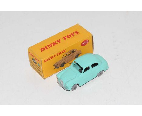 Dinky Toys No. 160 Austin A30 saloon comprising of turquoise body with grey plastic wheels in the original all-card picture s