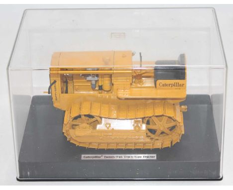 Norscot 1/16th scale diecast model of a Caterpillar Twenty Two Track Type Tractor, in the original plastic casing (NM-BVG)