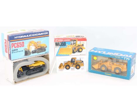 Construction group of 3 boxed models to include, New Clover 1/40th scale Hyundai HL770 Loader, Shinsei No. 614 Komastu PC650 