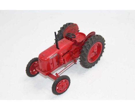 A Denzel Skinner Co. Ltd David Brown 25 Tractor model, all metal model finished with red body and wheels, black rubber tyres,