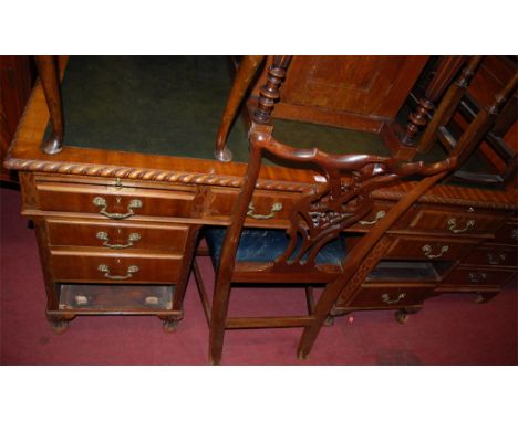 A Georgian style mahogany and green rexine inset twin pedestal writing desk of good size having a gadrooned edge, together wi