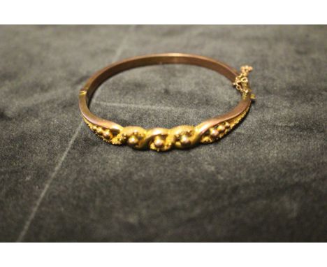 Two Antique Gold Bangles.  To include an Unmarked Yellow Metal (Possibly 15ct Gold?) Seed Pearl and Diamond Hinged Bangle wit
