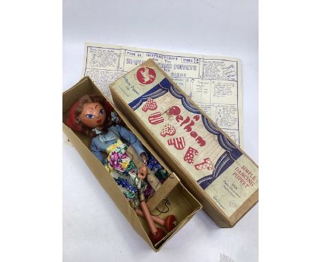  Vintage Pelham puppet boxed early toy of a Lady in country attire, good puppet with instruction sheet and box. ( 1 boxed pup