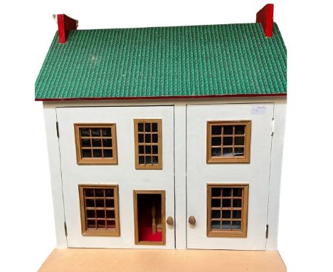     Vintage Toys ; A solid wooden vintage dolls house with double front opening with two boxes of wooden accompanying dolls s
