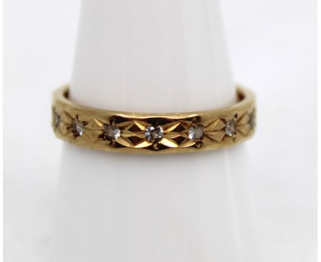 9ct Yellow Gold Cubic Zirconia Full Eternity Ring/Band  The ring contains approx. fifteen melee Round Brilliant Cut Cubic Zir