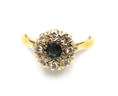 18ct Yellow Gold Sapphire and Diamond Ring.  The ring contains a Round Old European Cut Sapphire that measures approx. 0.20ct