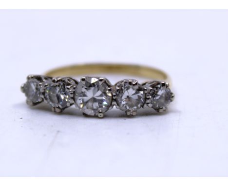 18ct Yellow Gold Five Stone Old European Cut Diamond ring. The centre Old European Cut Diamond measures approx. 0.50ct, the s