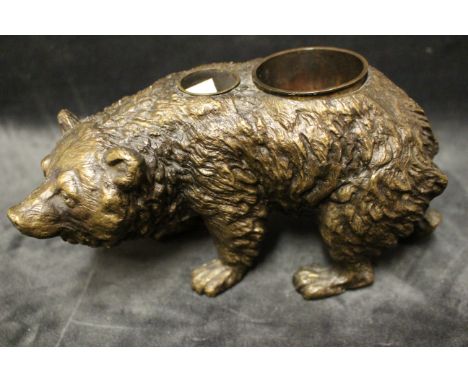 A cast bronze inkwell modelled as a bear, 20th century, 22cm long