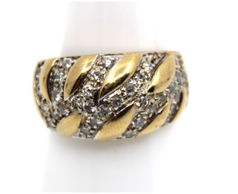 9ct Yellow Gold Cubic Zirconia Dress Ring  The ring contains approx. thirty-five melee Round Brilliant Cut Cubic Zirconia's. 