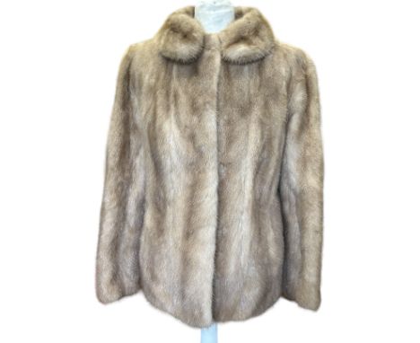 A 1950s/ 60s palamino mink jacket with a taupe jaquard lining and chamois lined set in pockets along with group of vintage an
