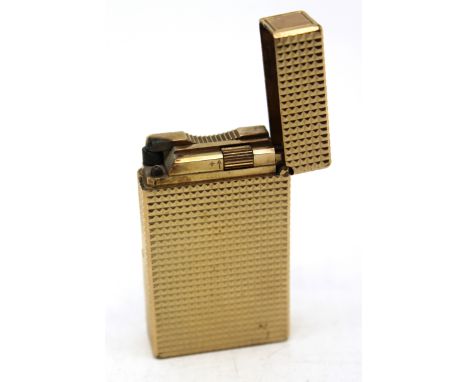 St. Dupont Gold Plated Lighter (Made in Paris, France) The Lighter has a textured finish and measures approx. 5.8cm height an