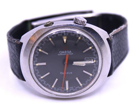 Omega Chronostop Geneve Divers Wristwatch. It has a stainless steel watch case with black leather strap.  Waterproof tested u