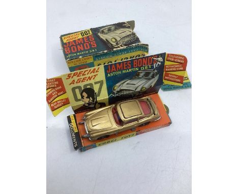   Corgi vintage toy ; Gold Aston Martin die-cast vehicle car in the larger part of the original box( flap loose-see images. G