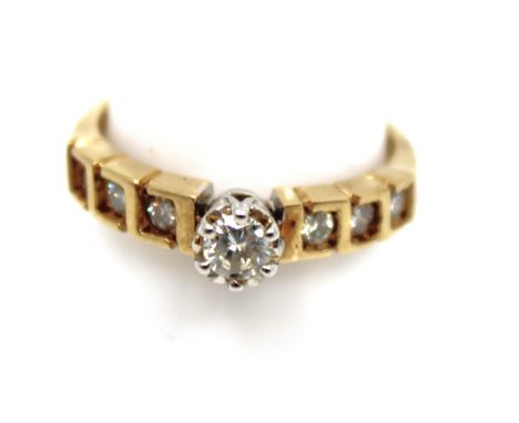 9ct Yellow Gold Round Brilliant Cut Diamond Engagement Ring.  The Centre Diamond measures approx. 0.25ct. There is three Roun