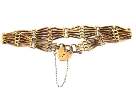 9ct Gold Gate Bracelet with Padlock and Safety Chain The Bracelet is hallmarked "375" for 9ct Gold.  The thickness of the bra