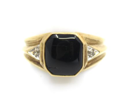 Men's 9ct Yellow Gold Black Onyx and Diamond Ring  The ring contains a rectangular step cut shaped polished Cabochon Black On