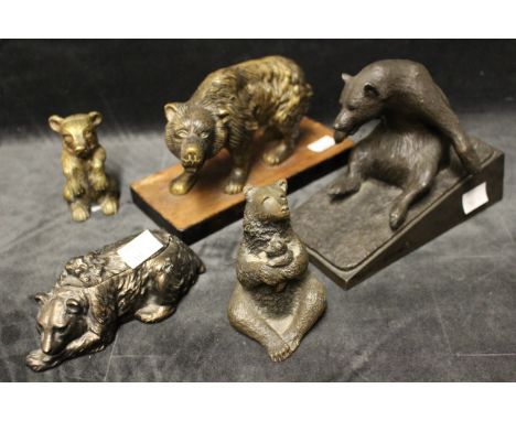 A bronze inkwell with hinged cover formed as a bear, two brass bears, a "bronze age" bear and a bronze effect bear on an angl