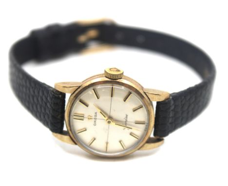Vintage Ladies 9ct Gold Omega Geneve Watch with black leather strap The round watch face width measures approx. 22mm includin