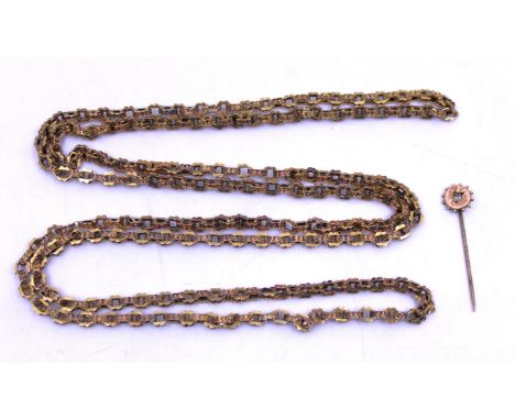 Gold Tone Chain and a Unmarked Yellow Metal Paste Stone Stick Pin.  The Gold Tone Chain measures approx. 108cm and weighs app