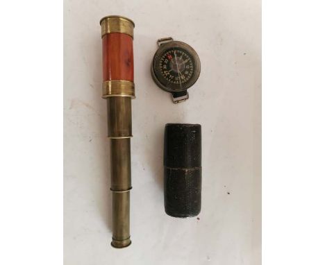 A Luftwaffe Kadlec AK39 Armband Compass together with a small brass extending telescope in case. (1)
