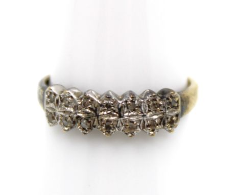 9ct Yellow Gold 0.10ct Total Diamond Dress Ring  The ring contains two rows of seven melee Round Brillliant Cut Diamonds set 