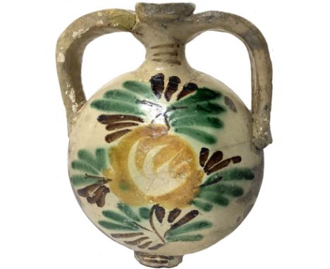 Flask majolica of Caltagirone, Sicily, late nineteenth century. H Cm 25. Restoration on the handle