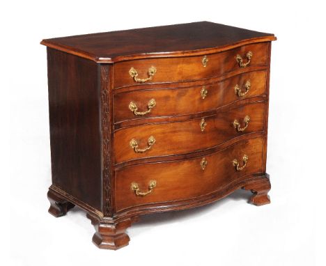 A George III mahogany serpentine fronted chest of drawers, circa 1780, the shaped and crossbanded top with a moulded edge, th