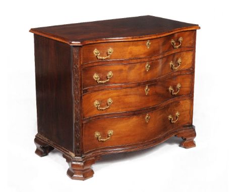 A George III mahogany serpentine fronted chest of drawers, circa 1780, the shaped and crossbanded top with a moulded edge, th