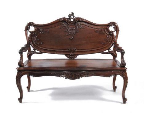 ϒA pair of carved padouk or rosewood seats, third quarter 19th century, in the French taste, possibly Colonial, each carved a