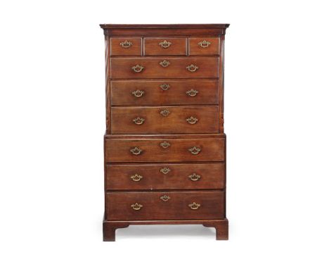 A George II mahogany chest on chest, circa 1750, the moulded cornice above three short and six long graduated drawers, flanke