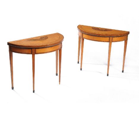 ϒA pair of George III satinwood and specimen marquetry folding card tables, circa 1790, in the manner of Mayhew and Ince, of 