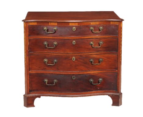 A George III mahogany serpentine fronted chest of drawers, circa 1770, the shaped top with moulded edge above an inlaid friez