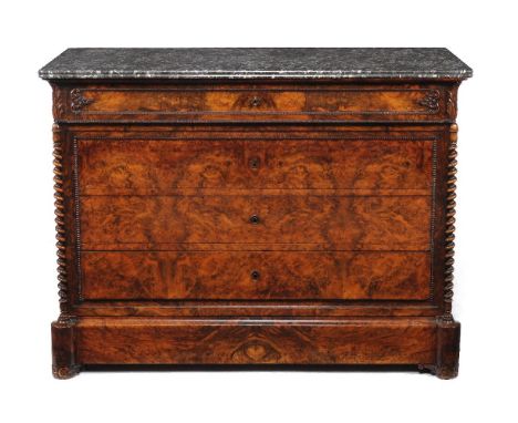 A Louis Philippe burr and figured walnut commode, circa 1850, the variegated grey marble top above frieze drawer, three furth