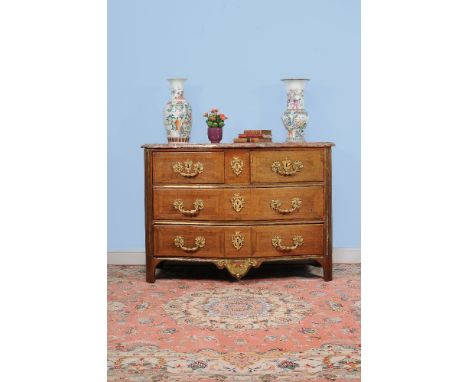 ϒ A Louis XV rosewood and gilt metal mounted serpentine fronted commode, circa 1750, the marble top with moulded edge, above 
