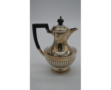 An Edwardian Mappin and Webb sterling silver gadrooned coffee pot with ebony handle. Hallmarked M&amp;W, Sheffield,1910. Gros