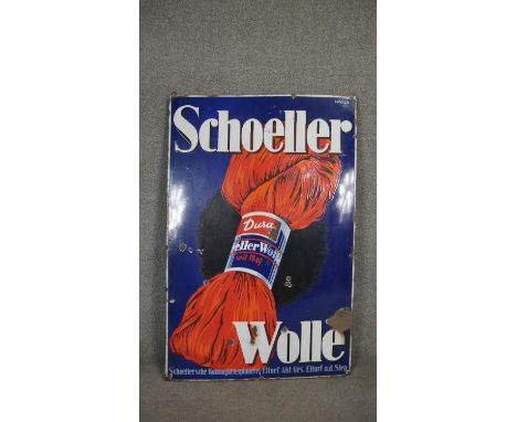 A large vintage German coloured enamel advertising sign for Schoeller Woole. H.118 W.77cm 
