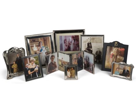 A selection of framed photographs of members of the cast of The Crown in characterTo include photographs of Claire Foy (as th