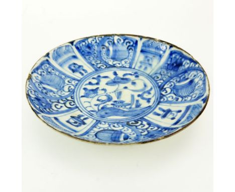 17th Century Persian Blue and White Glazed Ceramic Shallow Bowl. Depicts several floral motif on surface, raised edges, foote
