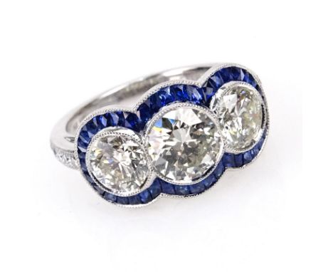 Art Deco style Approx. 2.67 Carat Round Brilliant Cut Diamond and Platinum Three Stone Ring accented with .88 Carat French Cu